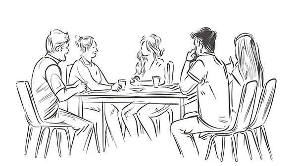 Fünf Menschen am Tisch diskutieren.